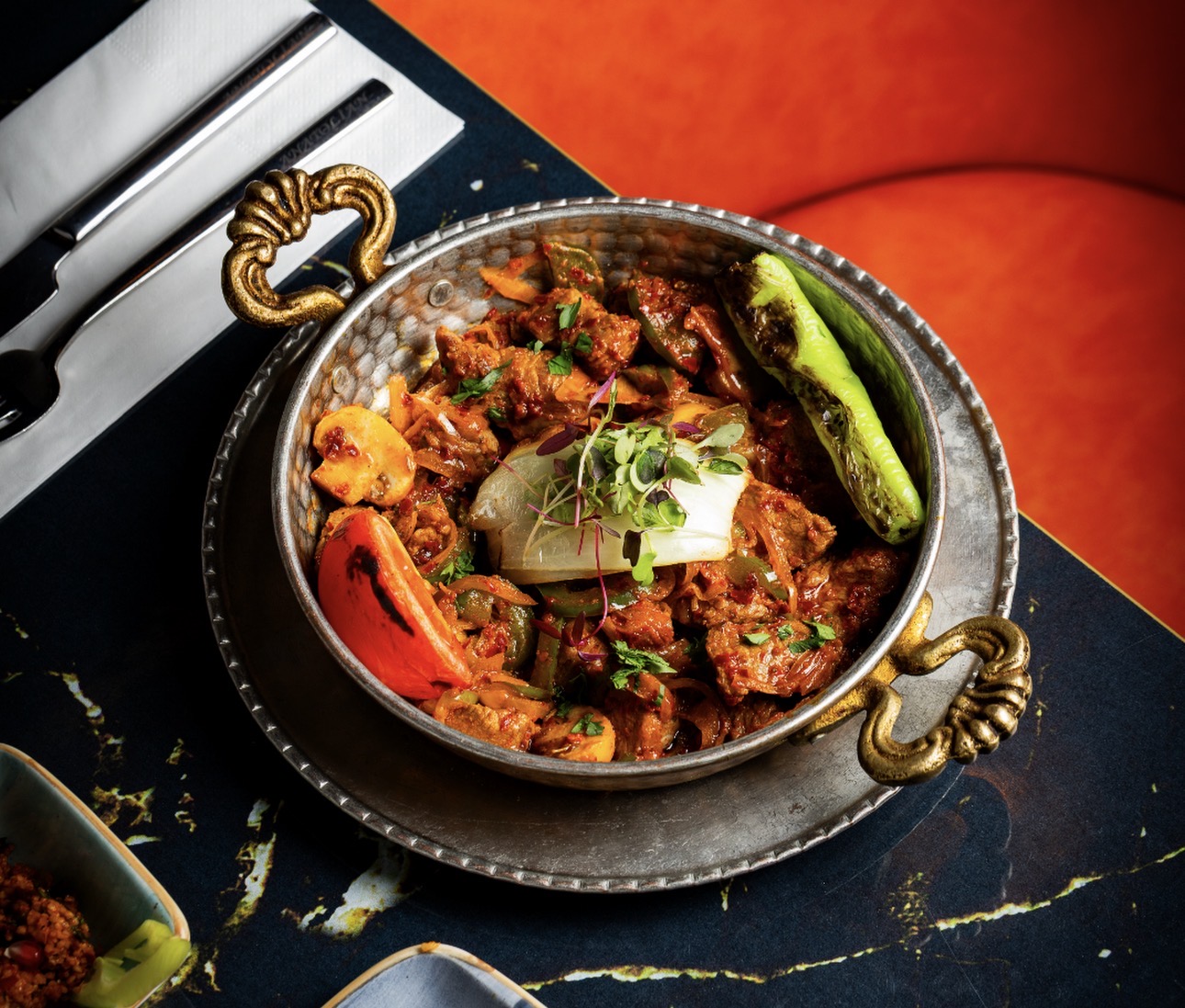 A sizzling Anatolian meat dish served in copper